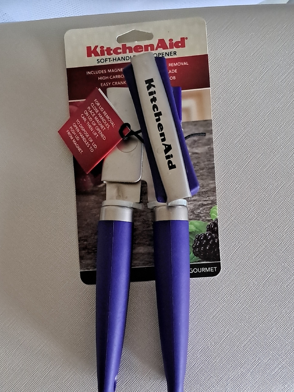 KitchenAid Purple Soft-Grip Can Opener with Silver Accents
